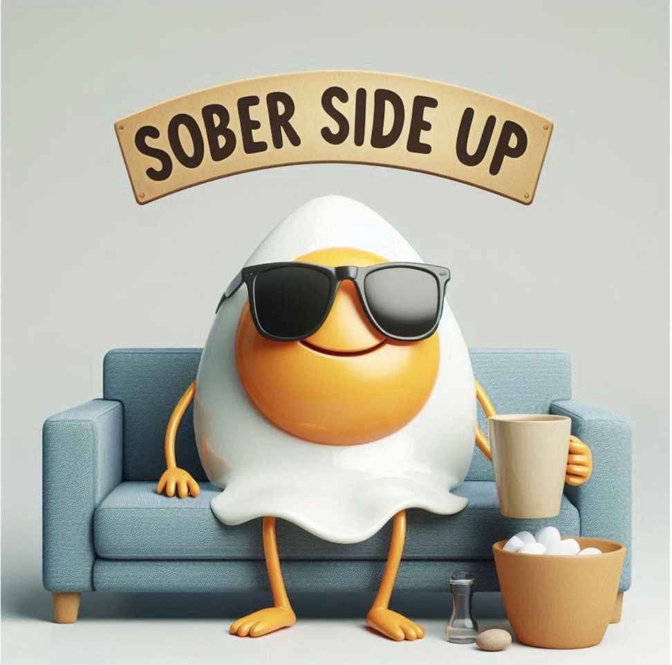 Sober Side Up mascot sitting on a couch with coffee